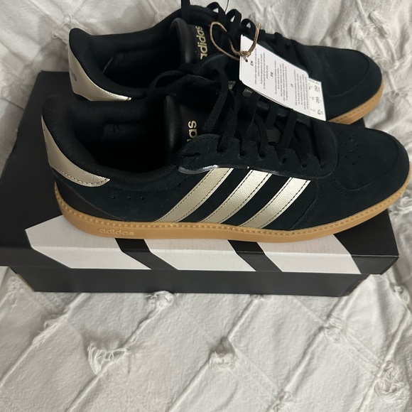 adidas Shoes - Adidas Black with Gold Stripes Sneakers